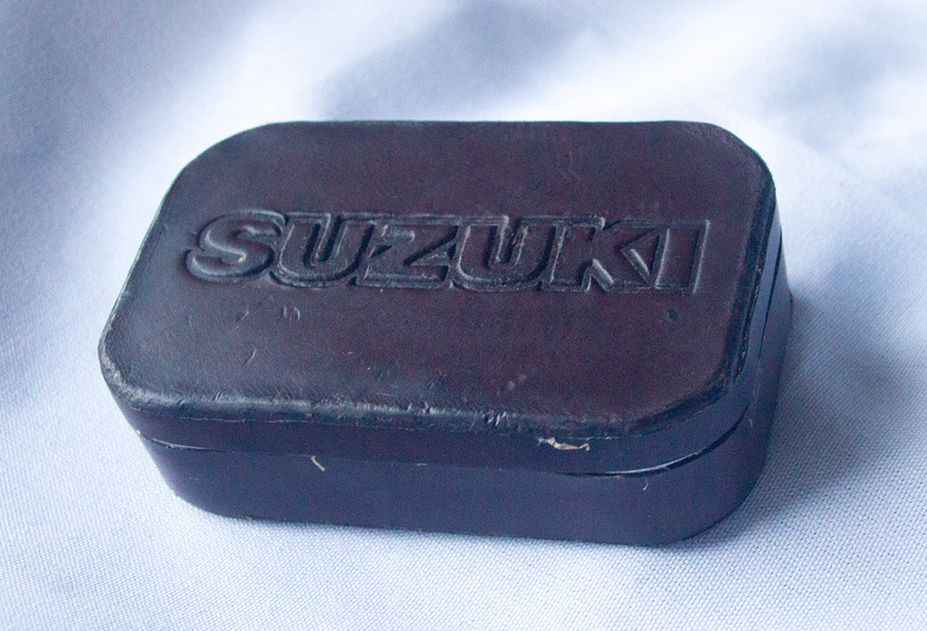 Suzuki Leather Covered Tin